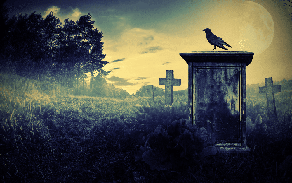 Spooky image of a dark graveyard - not the best place to read a chilling ghost story!