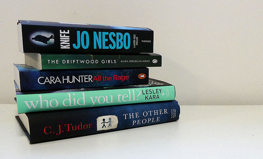 stack of books for best books out in january