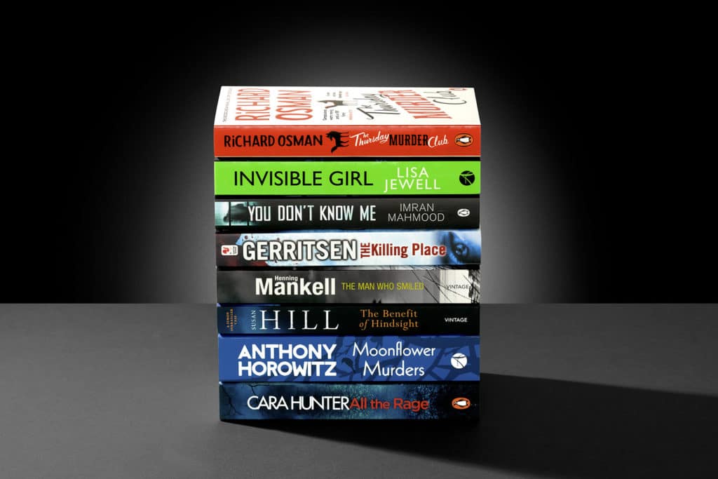 Photo showing some of our readers' favourite book club books: The Thursday Murder Club, Invisible Girl, You Don't Know Me, The Killing Place, The Man Who Smiled, The Benefit of Hindsight, Moonflower Murders and All the Rage